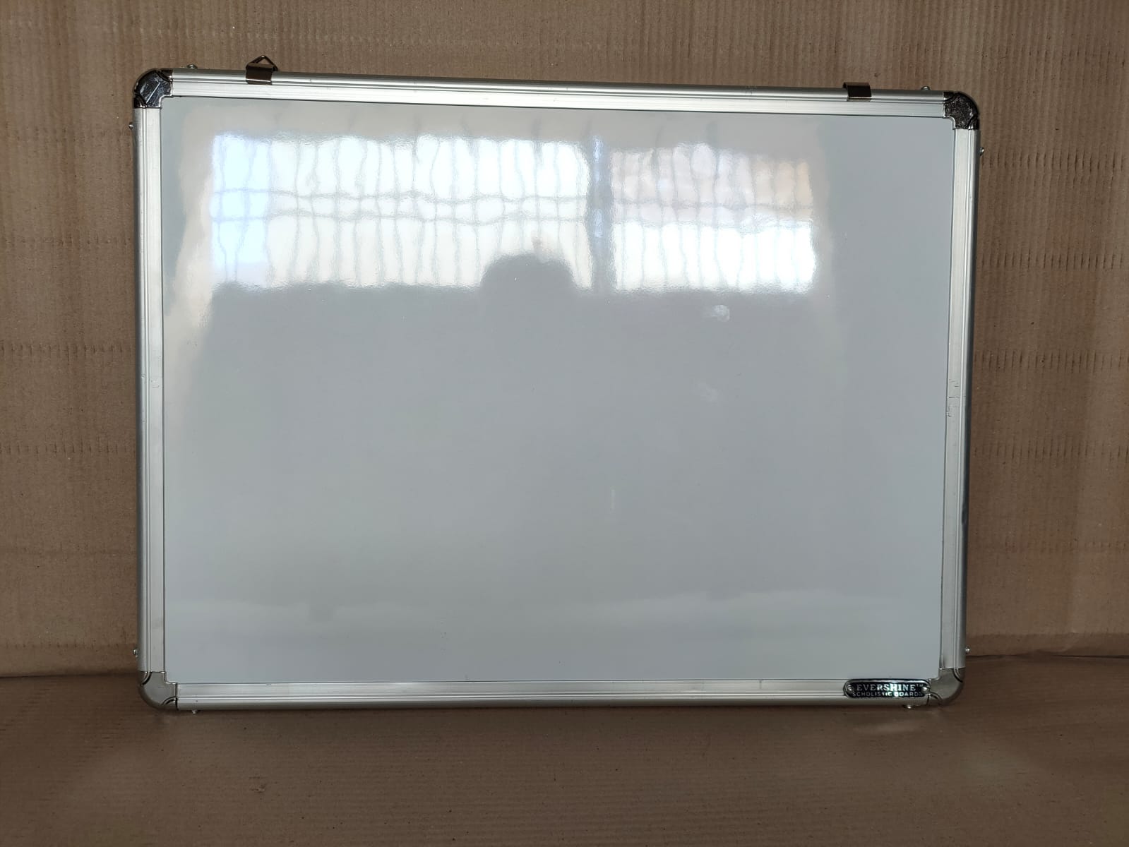 Evershine white marker board fixed on an office meeting-room wall